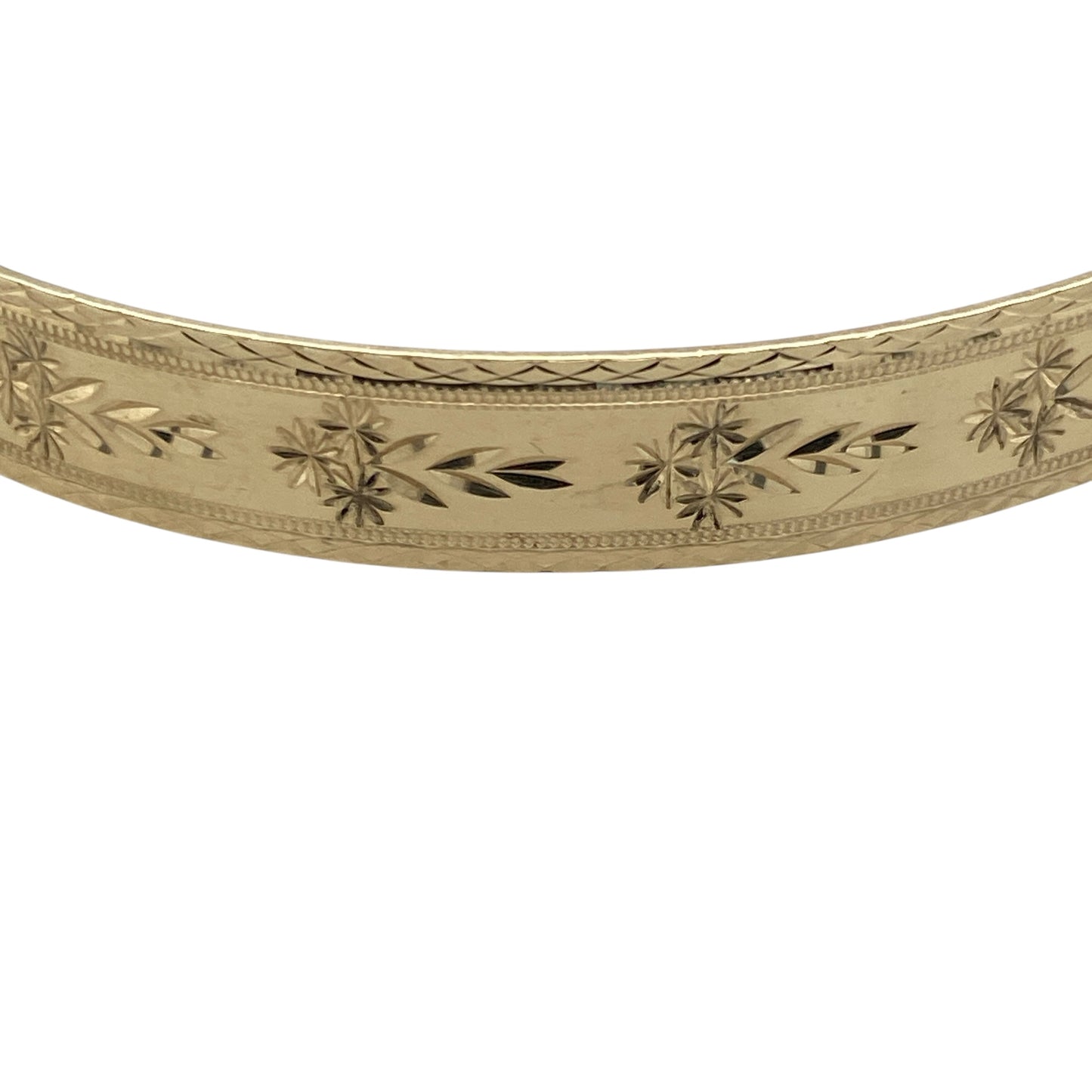 Add timeless style and versatility to your collection with this pre-owned 9ct yellow solid gold expanding patterned bangle, a substantial design with elegant detailing—perfect for both everyday wear and special occasions.

Design: The bangle features an intricate patterned finish with an expanding design, allowing for flexibility and a comfortable fit.
Material: Made from solid 9-carat yellow gold, the polished surface enhances the decorative pattern while ensuring lasting durability and shine.
