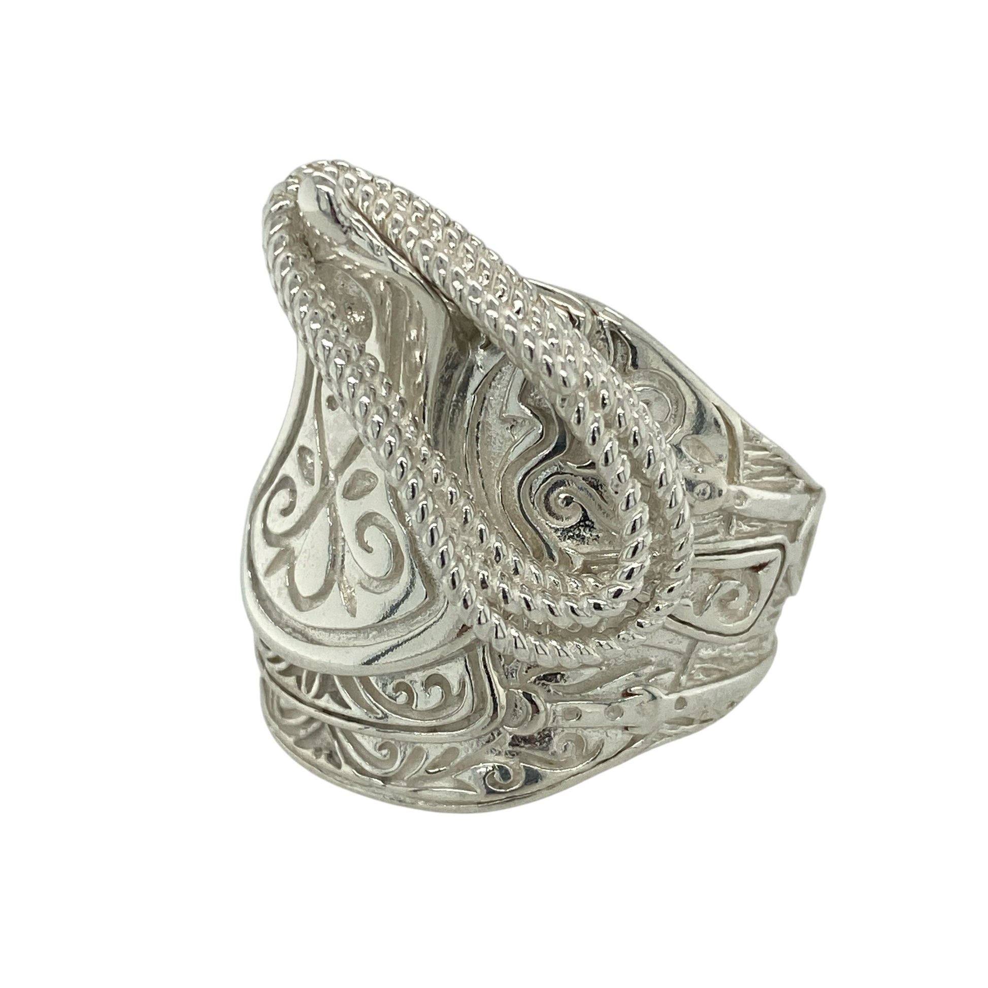 Make a bold statement with this new 925 solid silver saddle ring, a heavyweight design with detailed craftsmanship—perfect for those who love standout jewellery.

Design: The ring features a wide saddle front with intricate patterned detailing, measuring 29mm high for striking presence on the hand.
Material: Made from solid 925 sterling silver, the polished finish enhances durability while highlighting the ornate design.