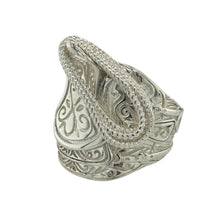 Load image into Gallery viewer, Make a bold statement with this new 925 solid silver saddle ring, a heavyweight design with detailed craftsmanship—perfect for those who love standout jewellery.

Design: The ring features a wide saddle front with intricate patterned detailing, measuring 29mm high for striking presence on the hand.
Material: Made from solid 925 sterling silver, the polished finish enhances durability while highlighting the ornate design.
