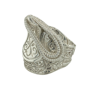 Make a bold statement with this new 925 solid silver saddle ring, a heavyweight design with detailed craftsmanship—perfect for those who love standout jewellery.

Design: The ring features a wide saddle front with intricate patterned detailing, measuring 29mm high for striking presence on the hand.
Material: Made from solid 925 sterling silver, the polished finish enhances durability while highlighting the ornate design.