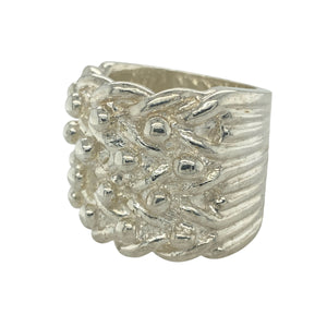 Make an unforgettable statement with this new 925 solid silver four row keeper ring, a heavyweight design with bold presence—perfect for collectors and those who love standout jewellery.

Design: The ring showcases four raised rows across the front, measuring an impressive 28mm high, creating a strong and commanding look.
Material: Made from solid 925 sterling silver, the polished finish enhances durability while highlighting the bold keeper style.