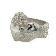 Load image into Gallery viewer, Celebrate tradition and bold style with this new 925 solid silver Claddagh ring, a substantial design symbolising love, loyalty, and friendship—perfect as a meaningful statement piece.

Design: The ring features the classic Claddagh motif with hands, heart, and crown, measuring 21mm high for striking presence on the hand.
Material: Made from solid 925 sterling silver, the polished finish enhances durability while showcasing the iconic design in bold detail.
