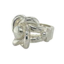 Load image into Gallery viewer, Add bold symbolism to your collection with this new 925 solid silver knot ring, a heavyweight design representing unity and strength—perfect as a standout piece for everyday wear or special occasions.

Design: The ring features a large knot motif across the front, measuring 22mm high, creating a striking and meaningful look.
Material: Made from solid 925 sterling silver, the polished finish enhances durability while highlighting the intricate knot detail.
