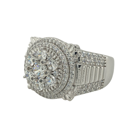 Make a bold statement with this new 925 silver cubic zirconia cluster ring, a striking watch-style design with standout sparkle—perfect for those who love eye-catching jewellery.

Design: The ring features a large round cluster face measuring 17mm high, styled in the look of a watch dial, with additional stones set along the shoulders for extra brilliance.
Material: Made from 925 sterling silver, the polished finish enhances durability while highlighting the sparkle of the cubic zirconia.