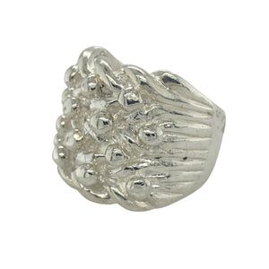 Make a bold impression with this new 925 solid silver four row keeper ring, a heavyweight design with strong presence—perfect for those who love standout jewellery.

Design: The ring showcases four raised rows across the front, measuring 22mm high, creating a striking and powerful look.
Material: Made from solid 925 sterling silver, the polished finish enhances durability while highlighting the bold keeper style.