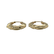 Load image into Gallery viewer, Bring geometric flair and classic elegance to your collection with these pre-owned 9ct yellow gold twisted octagon creole earrings—a stylish twist on a timeless design.

Design: Each earring features an octagon-shaped creole hoop with a subtle twisted pattern, combining structure with decorative detail.
Material: Made from 9-carat yellow gold, the polished finish enhances the warm tone and complements the unique shape.
