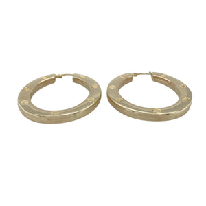 Bring bold style and timeless appeal to your collection with these pre-owned 9ct yellow gold large oval screw detail creole earrings—a statement design with classic character.

Design: Each earring features a large oval creole hoop enhanced with decorative screw detailing, adding texture and visual interest.
Material: Made from 9-carat yellow gold, the polished finish highlights the warm tone and complements the bold design.