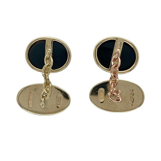 Bring sophistication and bold contrast to your collection with these pre-owned 9ct yellow gold and onyx oval cufflinks—a timeless accessory with refined detail.

Design: Each cufflink features an oval onyx stone measuring 14mm by 11mm, set in polished yellow gold for a sleek and elegant look.
Material: Made from 9-carat yellow gold, the polished finish enhances the warm tone of the gold and complements the deep black of the onyx.