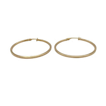 Load image into Gallery viewer, Bring sleek simplicity and timeless style to your collection with these pre-owned 9ct yellow gold flat hoop creole earrings—a classic choice for everyday wear.

Design: Each earring features a flat plain hoop design, offering a clean and versatile look.
Material: Made from 9-carat yellow gold, the polished finish enhances the warm tone and smooth surface.
Earring Detail: Lightweight and easy to wear, these hoops provide understated elegance suitable for any occasion.
