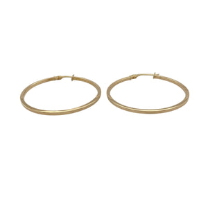 Bring sleek simplicity and timeless style to your collection with these pre-owned 9ct yellow gold flat hoop creole earrings—a classic choice for everyday wear.

Design: Each earring features a flat plain hoop design, offering a clean and versatile look.
Material: Made from 9-carat yellow gold, the polished finish enhances the warm tone and smooth surface.
Earring Detail: Lightweight and easy to wear, these hoops provide understated elegance suitable for any occasion.