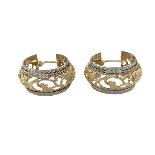 Bring bold contrast and elegant detail to your collection with these pre-owned 9ct yellow and white gold fancy patterned hoop creole earrings—a striking design with timeless appeal.

Design: Each earring features a wide open hoop with intricate fancy patterning, combining yellow and white gold for added depth and style.
Material: Made from 9-carat yellow and white gold, the polished finish enhances the warm and cool tones while highlighting the decorative detailing.