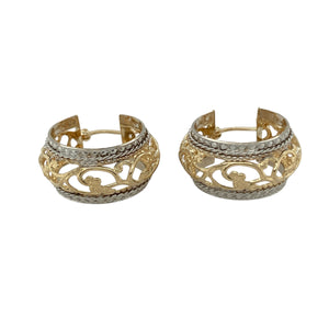 Bring bold contrast and elegant detail to your collection with these pre-owned 9ct yellow and white gold fancy patterned hoop creole earrings—a striking design with timeless appeal.

Design: Each earring features a wide open hoop with intricate fancy patterning, combining yellow and white gold for added depth and style.
Material: Made from 9-carat yellow and white gold, the polished finish enhances the warm and cool tones while highlighting the decorative detailing.