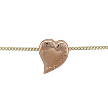 Load image into Gallery viewer, Bring romance and heritage charm to your collection with this pre-owned 9ct yellow and rose gold Clogau Cariad heart pendant on an 18&quot; curb chain—a meaningful piece with timeless elegance.

Design: The pendant measures 1.5cm long and features a polished heart engraved with the word Cariad—Welsh for “beloved”—for a sentimental touch.
Material: Made from 9-carat yellow and rose gold, the polished finish enhances the warm and blush tones, highlighting the romantic design.
