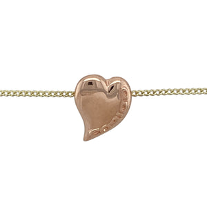Bring romance and heritage charm to your collection with this pre-owned 9ct yellow and rose gold Clogau Cariad heart pendant on an 18" curb chain—a meaningful piece with timeless elegance.

Design: The pendant measures 1.5cm long and features a polished heart engraved with the word Cariad—Welsh for “beloved”—for a sentimental touch.
Material: Made from 9-carat yellow and rose gold, the polished finish enhances the warm and blush tones, highlighting the romantic design.