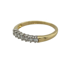 Load image into Gallery viewer, Bring refined sparkle and timeless elegance to your collection with this pre-owned 18ct yellow gold diamond band ring—a classic piece with understated brilliance.

Design: The band measures 3mm wide at the front and is set with approximately 0.14ct of diamonds, offering subtle yet eye-catching sparkle.
Material: Made from 18-carat yellow gold, the polished finish enhances the rich tone and provides a luxurious setting for the diamonds.
