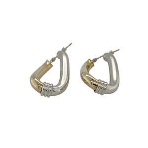 Bring two-tone elegance and timeless style to your collection with these pre-owned 9ct yellow and white gold hoop earrings, designed in an oval twist creole shape for added sophistication.

Design: Each earring features an oval hoop with a subtle twist, blending yellow and white gold tones for a versatile and eye-catching look.
Material: Made from 9-carat yellow and white gold, the polished finish enhances the contrast between the two metals.