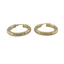 Load image into Gallery viewer, Bring classic elegance and everyday versatility to your collection with these pre-owned 9ct yellow gold hoop earrings, designed in a traditional creole style.

Design: Each earring features a smooth polished hoop, offering a timeless and easy-to-wear look.
Material: Made from 9-carat yellow gold, the polished finish enhances the warm golden tone and shine.
Earring Detail: The creole fitting ensures secure and comfortable wear, making them a reliable choice for daily use.
