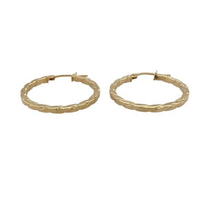 Bring subtle texture and timeless shine to your collection with these pre-owned 9ct yellow gold hoop earrings, styled in a twisted creole design for added elegance.

Design: Each earring features a classic hoop with a gentle twist, creating a refined look that catches the light beautifully.
Material: Made from 9-carat yellow gold, the polished finish enhances the warm tone and radiant shine.