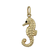 Load image into Gallery viewer, Bring ocean-inspired charm and playful detail to your collection with this pre-owned 9ct yellow gold pendant, designed as a seahorse with colourful enamel accents.

Design: The pendant features a finely detailed seahorse motif highlighted with enamel, adding vibrant character and unique appeal.
Material: Made from 9-carat yellow gold, the polished finish enhances the warm tone and complements the enamel detailing.
