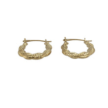 Load image into Gallery viewer, Bring subtle texture and golden shine to your collection with these pre-owned 9ct yellow gold creole earrings, styled in a twisted flat oval design for a refined finish.

Design: Each earring features a slender oval hoop with a gentle twist, creating a delicate shape that catches the light beautifully.
Material: Made from 9-carat yellow gold, the polished finish enhances the warm tone and elegant detail.
