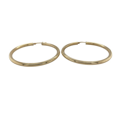Bring classic simplicity and timeless shine to your collection with these pre-owned 9ct yellow gold hoop earrings, styled in a traditional creole design.

Design: Each earring features a smooth, polished hoop for an elegant and versatile look.
Material: Made from 9-carat yellow gold, the polished finish enhances the warm tone and reflective shine.
Earring Detail: The creole style ensures secure and comfortable wear, making them ideal for daily use.