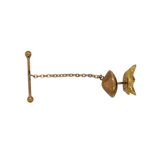 Bring character and refined detail to your collection with this pre-owned 9ct yellow gold tie pin, styled as a fox head with ruby-set eyes for a striking finish.

Design: The pin features a finely detailed fox head motif, accented with vivid ruby eyes that add colour and intensity to the design.
Material: Made from 9-carat yellow gold, the polished finish highlights the intricate detail, while the back fastening is base metal and not included in the gold weight.