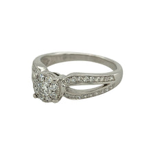 Load image into Gallery viewer, Bring refined sparkle and timeless elegance to your collection with this pre-owned 9ct white gold ring, styled with an illusion-set diamond cluster for maximum brilliance.

Design: The ring features a solitaire-style cluster of diamonds arranged in an illusion setting, giving the appearance of a larger central stone with a total diamond content of approximately 0.35ct.
