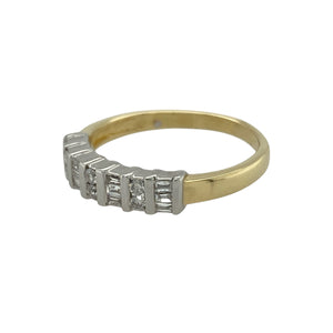 Bring refined sparkle and elegant design to your collection with this pre-owned 18ct yellow gold band ring, styled with a mix of brilliant and baguette-cut diamonds.

Design: The 4mm wide front of the band is set with alternating 0.20ct brilliant and baguette-cut diamonds, creating a sophisticated balance of sparkle and clean lines.
Material: Made from 18-carat yellow gold, the polished finish enhances the warm tone and provides a classic backdrop for the diamonds. 