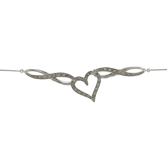 Bring romantic elegance and subtle sparkle to your collection with this pre-owned 9ct white gold necklace, featuring a diamond-set heart swirl pendant on a 20" chain.

Design: The pendant measures 15mm by 15mm and is styled as an open heart with a graceful swirl design, accented with diamonds for added brilliance.
Material: Made from 9-carat white gold, the polished finish enhances the cool tone and complements the sparkle of the stones.