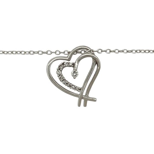 Celebrate love and sparkle with this pre-owned 9ct white gold double heart diamond pendant, paired with a 16" belcher chain for a timeless and romantic look.

Design: The pendant features two interlinked hearts, delicately accented with diamonds for a touch of brilliance and sentiment.
Material: Made in 9-carat white gold, the polished finish enhances the diamonds’ radiance and gives a sleek, modern tone.