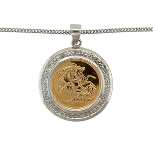 Combine timeless heritage and refined sparkle with this pre-owned 9ct white gold diamond half sovereign mount pendant, set with a 22ct gold 2003 Queen Elizabeth II half sovereign and paired with an 18" curb chain.

Design: The pendant features a 3.6cm long mount, including the bail, crafted to hold a 2003 Queen Elizabeth II half sovereign, framed with sparkling diamonds for a luxurious finish.
