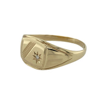 Load image into Gallery viewer, Add subtle sparkle to a classic design with this pre-owned 9ct yellow gold diamond signet ring, a timeless piece with a modern twist.

Design: The ring features a rounded rectangular signet face measuring 10mm high, finished with a small diamond set in one corner for understated elegance.
Material: Made in 9-carat yellow gold, the polished finish enhances the warm golden tone and highlights the sleek profile.
