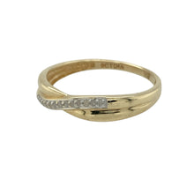 Load image into Gallery viewer, Bring refined simplicity to your collection with this pre-owned 9ct yellow gold diamond crossover band ring, a timeless design with subtle sparkle.

Design: The ring features a 4mm wide crossover band, delicately accented with diamonds for an elegant touch.
Material: Made in 9-carat yellow gold, the polished finish enhances the warm tone and highlights the diamonds’ brilliance.
Ring Detail: The crossover style creates a graceful, flowing look, perfect for everyday wear or as a complement to other rings.
