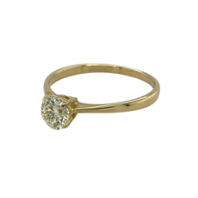 Load image into Gallery viewer, Celebrate enduring elegance with this pre-owned 18ct yellow gold diamond solitaire ring, a timeless piece designed to showcase the brilliance of a single stone.

Design: The ring features a brilliant-cut diamond of approximately 0.60ct, displayed in a classic solitaire setting for maximum sparkle.
Material: Made in 18-carat yellow gold, the polished finish provides a warm contrast that enhances the diamond’s fire and brilliance.
