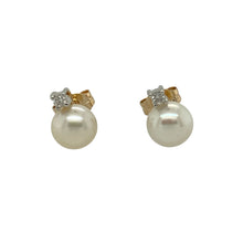 Load image into Gallery viewer, Bring timeless elegance to your collection with these pre-owned 9ct yellow gold pearl and diamond stud earrings, a classic combination of lustre and sparkle.

Design: Each stud features a 6mm round pearl, accented with a delicate diamond for added brilliance and sophistication.
Material: Made in 9-carat yellow gold, the polished finish provides a warm glow that complements the soft sheen of the pearls and the sparkle of the diamonds.
