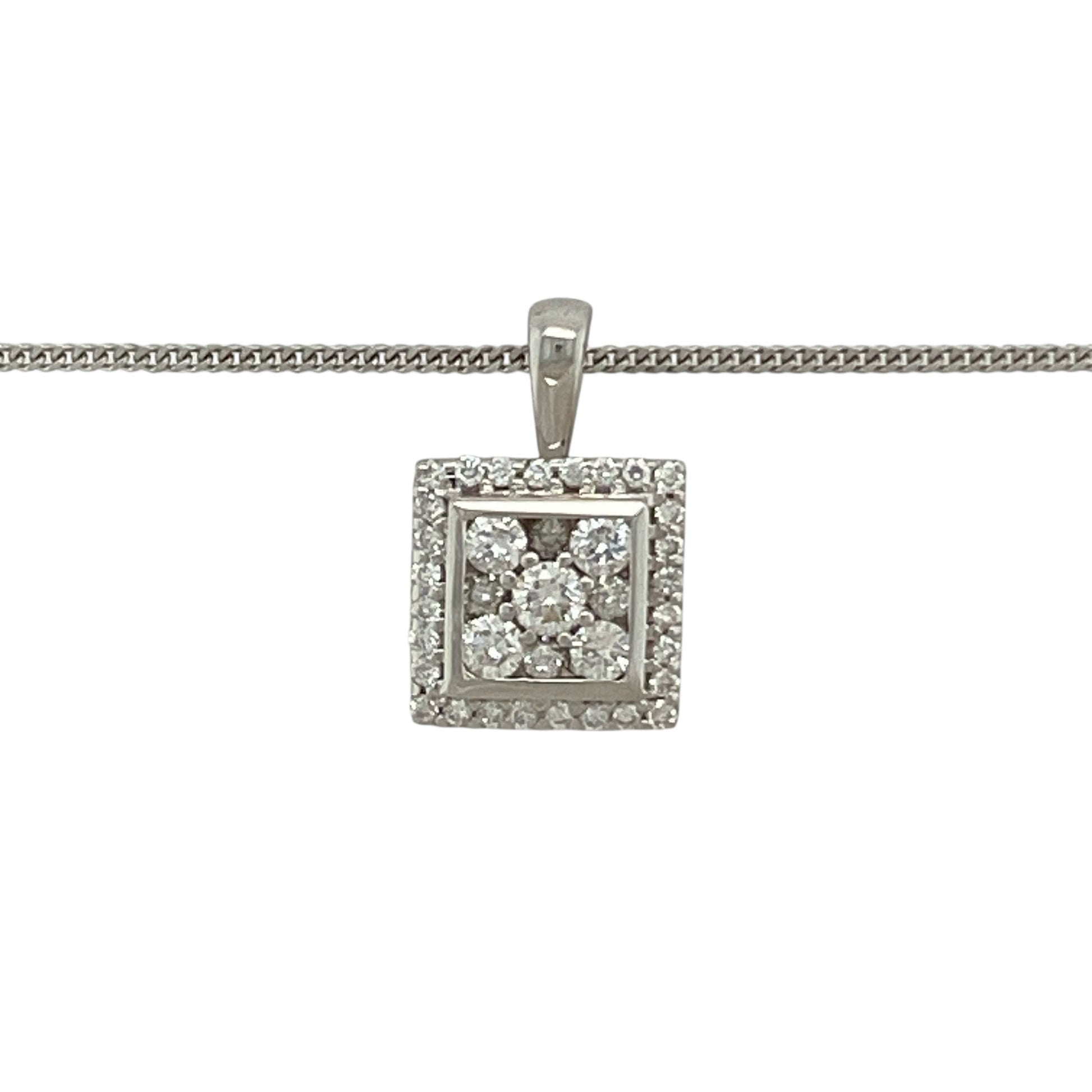 Bring refined sparkle to your collection with this pre-owned 18ct white gold diamond square halo pendant, paired with a 16" fine curb chain for timeless elegance.

Design: The pendant measures 1.5cm long including the bail and features a square halo design, made up of brilliant-cut diamonds for maximum radiance.
Material: Made in 18-carat white gold, the polished finish provides a bright, modern backdrop that enhances the brilliance of the diamonds.