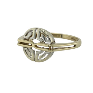 Add unique style to your collection with this pre-owned 9ct yellow and white gold open circle pattern ring, a bold design with timeless appeal.

Design: The ring features an open circular pattern across the front, measuring 12mm high, creating a modern yet elegant look.
Material: Made in 9-carat yellow and white gold, the polished finish highlights the contrast between the two tones for added detail.