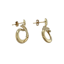 Load image into Gallery viewer, Add graceful movement to your collection with these pre-owned 9ct yellow gold swirl drop earrings, a stylish design with timeless appeal.

Design: Each earring features an elegant swirl motif that catches the light beautifully, creating a flowing and eye-catching look.
Material: Made in 9-carat yellow gold, the polished finish enhances the warm golden tone and adds refined shine.
Earring Detail: Lightweight yet striking, these drop earrings are versatile enough for both everyday wear and special occasions.
