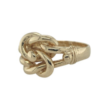 Load image into Gallery viewer, Bring striking style and symbolic charm to your collection with this pre-owned 9ct yellow gold knot ring, a bold design that represents strength, unity, and everlasting connection.

Design: The ring showcases a statement knot detail at the front, measuring 13mm high, creating a distinctive and eye-catching focal point.
Material: Made from 9-carat yellow gold, the polished finish enhances the bold shape and adds a warm, classic tone.
