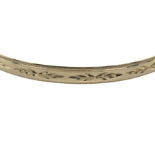 Load image into Gallery viewer, Bring timeless elegance and refined detail to your collection with this pre-owned 9ct yellow solid gold patterned bangle, a versatile piece perfect for everyday wear or special occasions.

Design: The bangle features a classic round shape with a 5mm wide patterned surface, adding texture and sophistication to the design.
Material: Made from solid 9-carat yellow gold, the polished finish enhances the intricate pattern while giving the piece a warm and classic tone.
