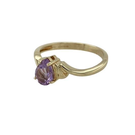 Bring vibrant colour and elegant style to your collection with this pre-owned 9ct yellow gold and amethyst teardrop ring, a refined design perfect for both everyday wear and special occasions.

Design: The ring features a 7mm by 5mm teardrop-shaped amethyst, offering a rich purple hue with a graceful and feminine profile.
Material: Made from 9-carat yellow gold, the polished finish enhances the warm tone of the band and complements the vivid colour of the stone.
