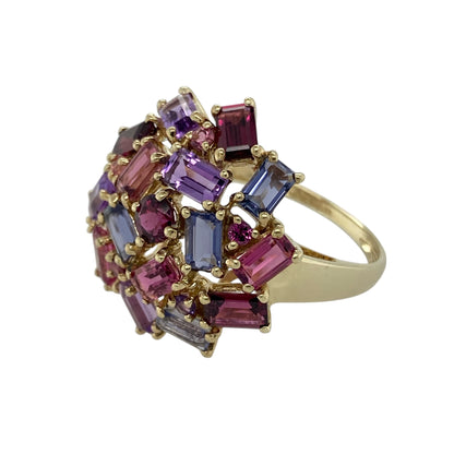 Bring vibrant colour and striking design to your collection with this pre-owned 9ct yellow gold multi gemstone cluster ring, a bold piece that combines elegance with eye-catching detail.

Design: The ring features a large cluster front measuring 24mm high, set with a mix of rectangular and round-cut pink tourmaline, pink topaz, and amethyst stones for a lively and colourful display.