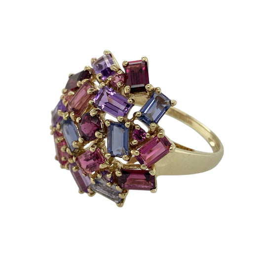 Bring vibrant colour and striking design to your collection with this pre-owned 9ct yellow gold multi gemstone cluster ring, a bold piece that combines elegance with eye-catching detail.

Design: The ring features a large cluster front measuring 24mm high, set with a mix of rectangular and round-cut pink tourmaline, pink topaz, and amethyst stones for a lively and colourful display.