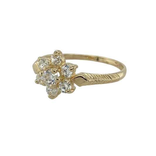 Bring delicate sparkle and feminine charm to your collection with this pre-owned 9ct yellow gold flower cluster ring, a graceful design perfect for everyday wear or special occasions.

Design: The ring features a 9mm high floral cluster, set with cubic zirconia stones that create a bright and eye-catching finish.
Material: Made from 9-carat yellow gold, the polished band provides a warm contrast to the sparkling stones.