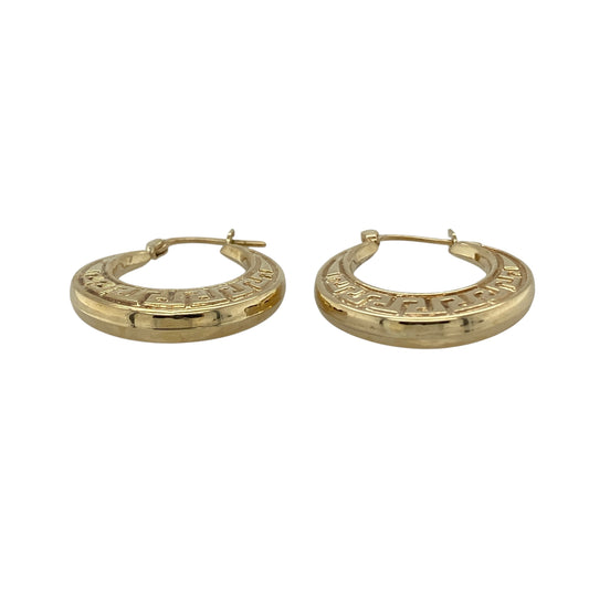 Bring classic design and timeless detail to your collection with these pre-owned 9ct yellow gold Greek key creole earrings, a versatile pair with symbolic character.

Design: The earrings feature a traditional creole shape with a Greek key pattern, adding texture and a touch of heritage style.
Material: Made from 9-carat yellow gold, the polished finish highlights the intricate detailing while giving the earrings a warm glow.