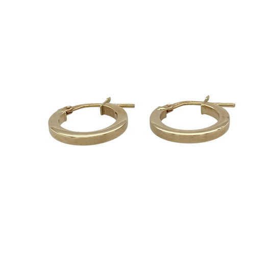 Bring simple elegance and classic shine to your collection with these pre-owned 9ct yellow gold small polished hoop creole earrings, a timeless pair perfect for everyday wear.

Design: The earrings feature a traditional small hoop creole shape with a smooth polished finish for a clean and versatile look.
Material: Made from 9-carat yellow gold, the polished surface adds a warm and refined glow.
Earring Detail: Lightweight and easy to wear, these creoles are ideal for daily use, stacking with other earrings