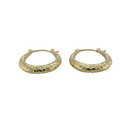 Bring elegant detail and timeless style to your collection with these pre-owned 9ct yellow gold patterned oval creole earrings, a versatile pair perfect for everyday wear or special occasions.

Design: The earrings feature a classic oval creole shape with a patterned surface, adding subtle texture and charm to a traditional style.
Material: Made from 9-carat yellow gold, the polished finish enhances the detailing while giving the earrings a warm glow.