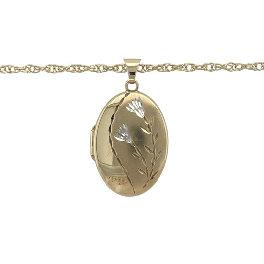 Bring sentimental elegance and timeless detail to your collection with this pre-owned 9ct yellow gold oval locket necklace, engraved with a floral design and suspended from a classic chain.

Design: The pendant measures 3.3cm long including the bail and features a traditional oval shape engraved with a delicate flower motif, adding charm and character.
Material: Made from 9-carat yellow gold, the polished finish enhances the engraved detailing while giving the piece a warm and refined glow.
