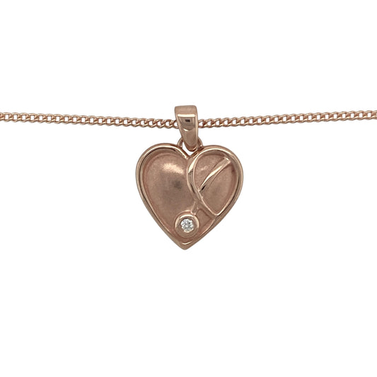 Bring romantic elegance and symbolic meaning to your collection with this pre-owned 9ct rose gold and diamond Clogau Vine of Life heart pendant necklace, a refined design celebrating love and harmony.

Design: The pendant measures 2.2cm long including the bail and features an open heart motif adorned with the delicate Vine of Life design, accented with sparkling diamonds for added brilliance.