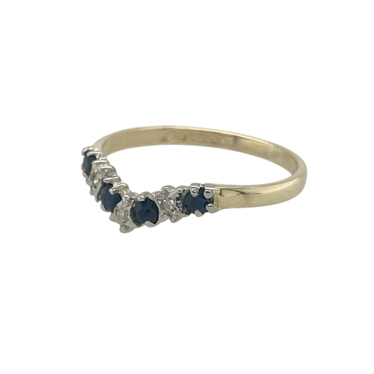 Bring classic elegance and a touch of colour to your collection with this pre-owned 9ct yellow gold diamond and sapphire wishbone ring, a refined design perfect for both everyday wear and special occasions.

Design: The ring features a graceful wishbone shape, adorned with alternating 2mm sapphires and sparkling diamonds for a balanced and eye-catching finish.